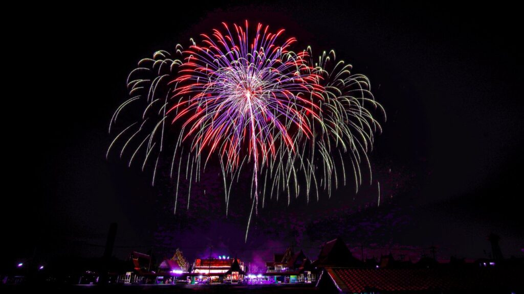 fireworks over the temple in the dark