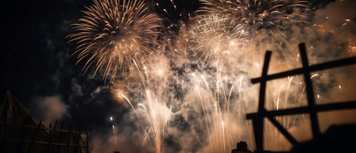 Explosive fireworks light up the dark night sky