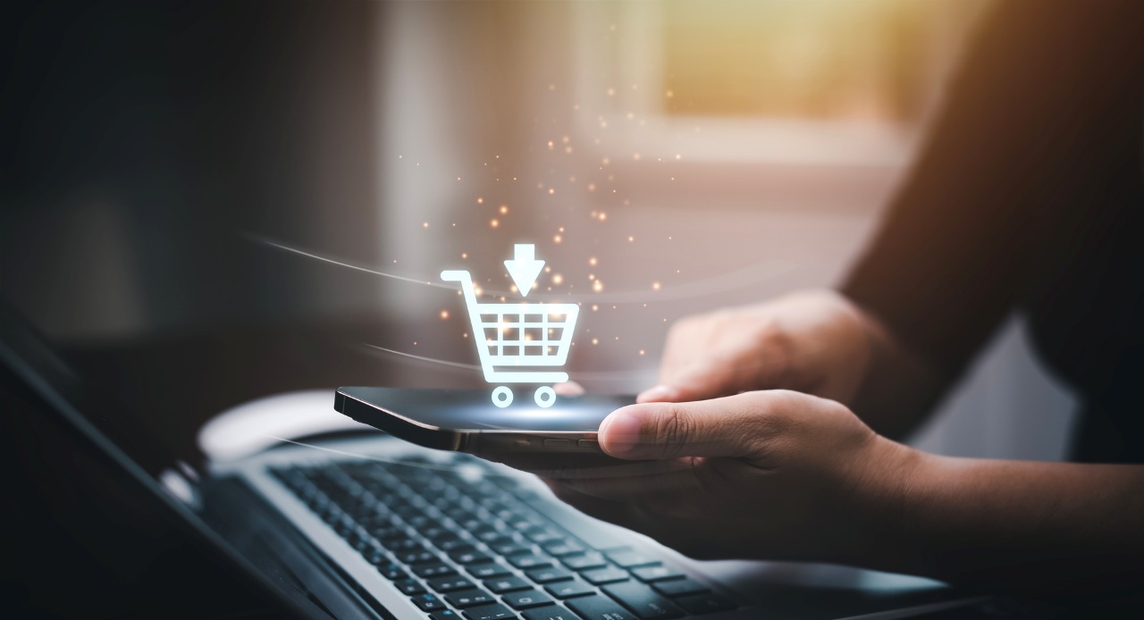 man using a laptop with online shopping concept,