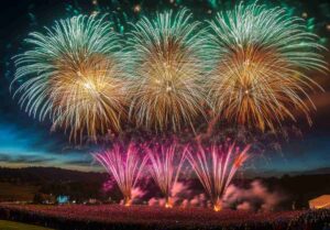 Colorful fireworks lighting up the sky with large bursts